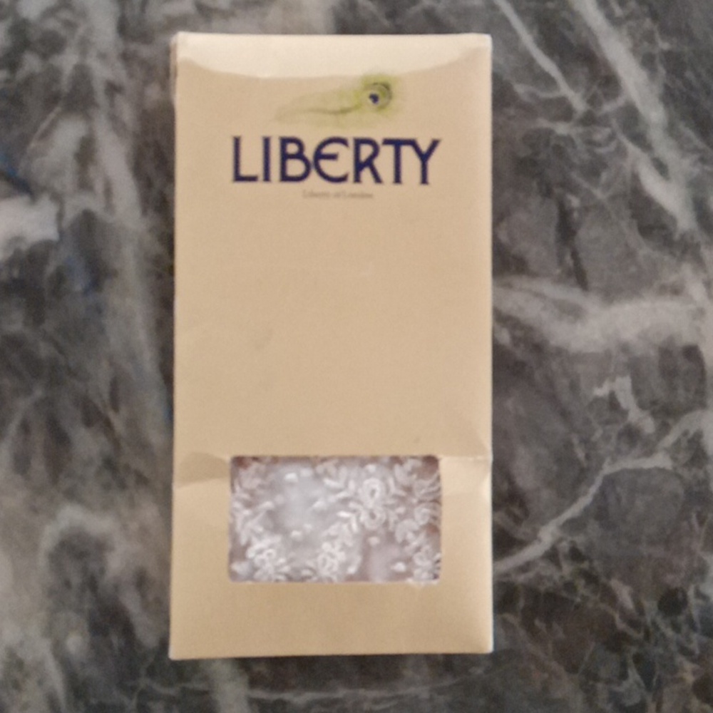 Vintage Liberty of London head scarf in box never used.